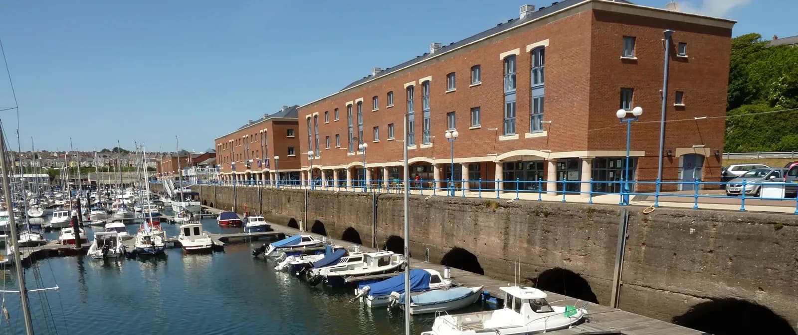 A serene waterfront view of Milford Docks in Pembrokeshire